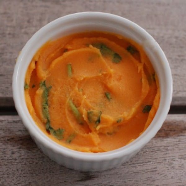 Creamy sweetpotato puree and garlicky black beans and spinach make a sweet and savory filling for gluten-free, vegetarian quesadillas. Recipe via JessicaLevinson.com #Sweetpotatoquesadillas #BlackBeanQuesadillaRecipe Sweetpotato Puree in White Bowl