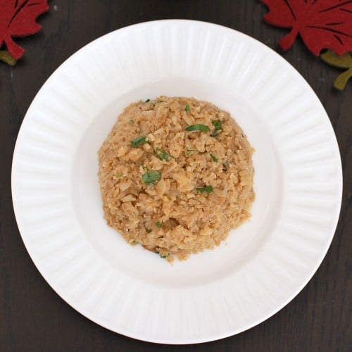 Crispy cauliflower rice with cilantro Crispy Cauliflower "Rice" vegetarian, grain-free side dish.