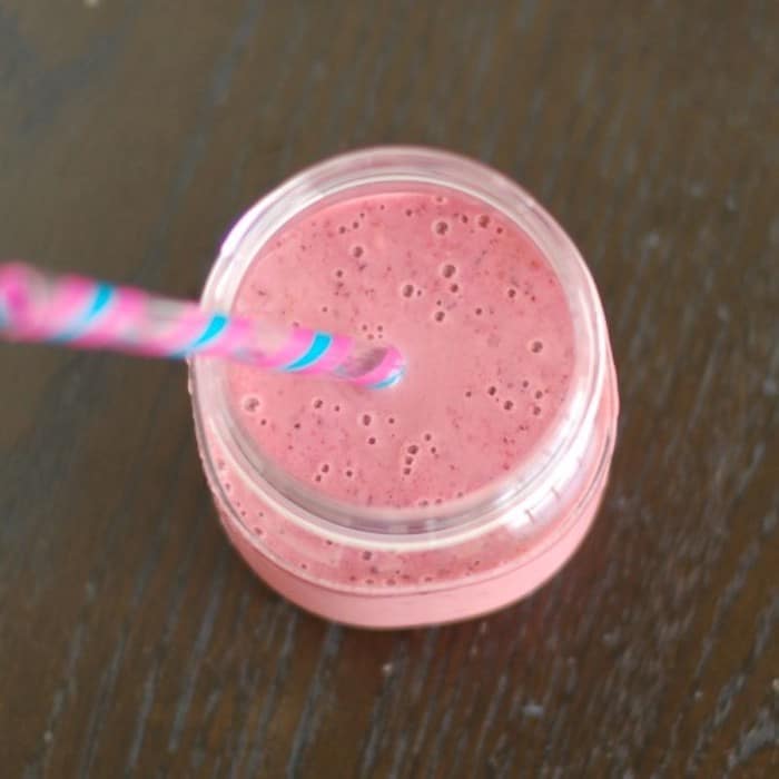 AD | This creamy mixed berry yogurt smoothie is fiber-rich and an excellent source of vitamin C, potassium, and calcium. Get the gluten-free and vegetarian recipe via JessicaLevinson.com #BerrySmoothieRecipe #HealthySmoothieRecipe Mixed Berry Yogurt Smoothie Overhead