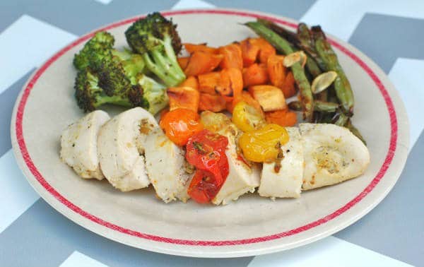 These Pistachio-Stuffed Chicken Breasts are filled with creamy pistachio mustard with a hint of lemon. An easy weeknight meal that will please the whole family. Get the gluten-free and dairy-free recipe via JessicaLevinson.com | #PistachioStuffedChicken #StuffedChickenRecipe Pistachio-Stuffed Chicken Breasts Recipe on Plate