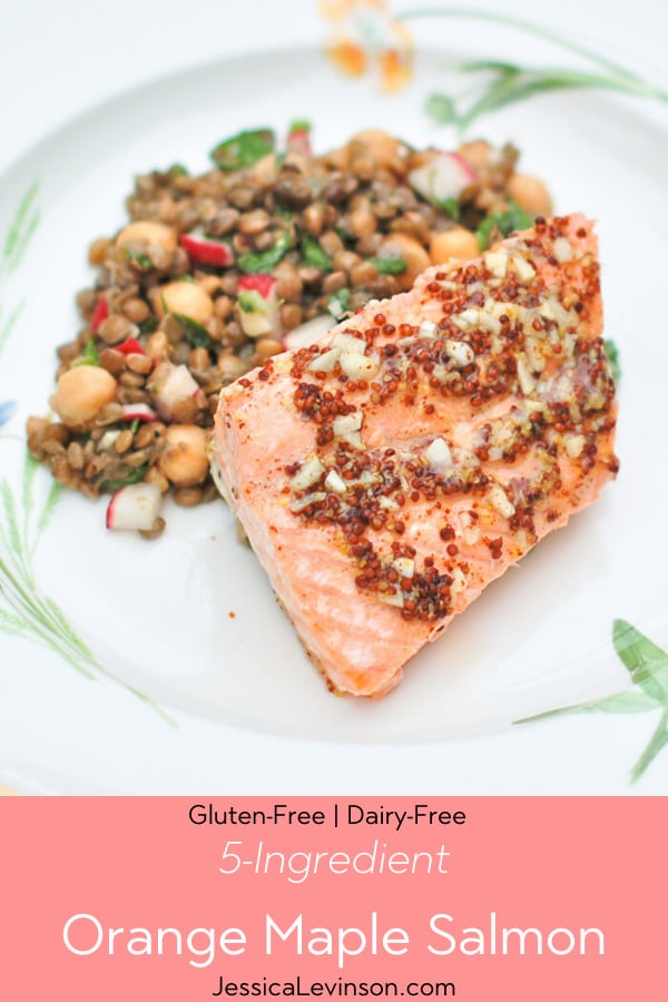 This sweet and tangy 5-ingredient orange maple salmon takes less than 30 minutes to make and is a hit with the entire family, kids included! All around a perfect weeknight meal for busy households. Get the gluten-free and dairy-free recipe at JessicaLevinson.com ! orange maple salmon dinner plate with text overlay
