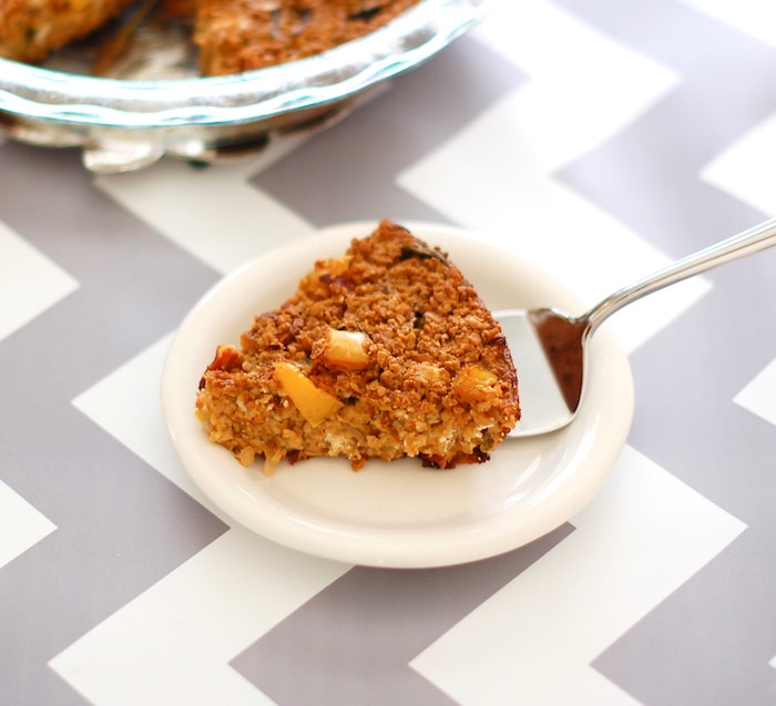 Heart-healthy oats are combined with sun-dried tomatoes, baby spinach, thyme, and creamy goat cheese in this savory baked oatmeal frittata. Recipe at JessicaLevinson.com | #GlutenFree #vegetarian #vegetarianrecipes #recipes #dinner #quickandeasy #frittata #oatmeal #savoryoats #bakedoatmeal savory baked oatmeal with sun-dried tomatoes, spinach, and goat cheese