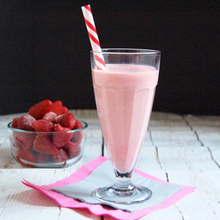 Strawberry Kefir Smoothie Strawberry Kefir Smoothie in tall glass with straw