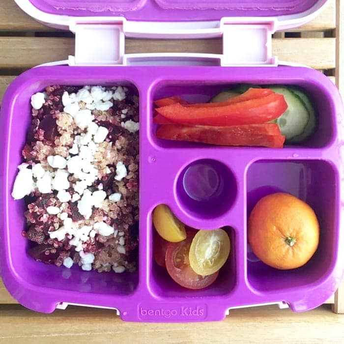Beet and Goat Cheese Quinoa Salad is a simple pairing for a quick and easy lunch. Delicious on its own, over a bed of greens, or as a side dish next to your main course. Get the vegetarian, gluten-free, and nut-free recipe via JessicaLevinson.com #QuinoaSaladRecipe #BeetandGoatCheeseSalad Beet and Goat Cheese Quinoa Salad in Lunchbox